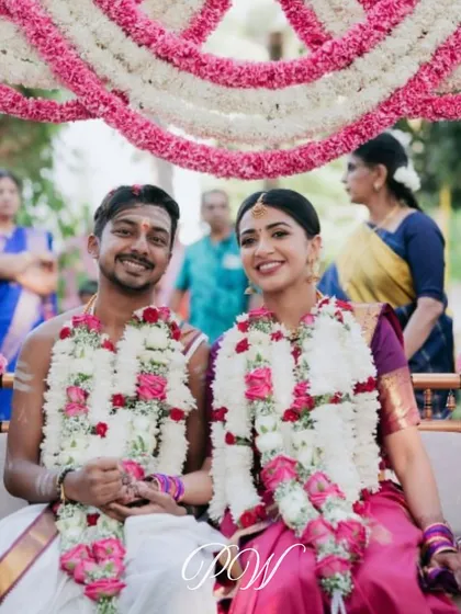 The Oonjal or swing ceremony, an important part of many South Indian weddings. We decorated this swing with garlands of pink and white flowers, creating a beautiful focal point for the ritual.