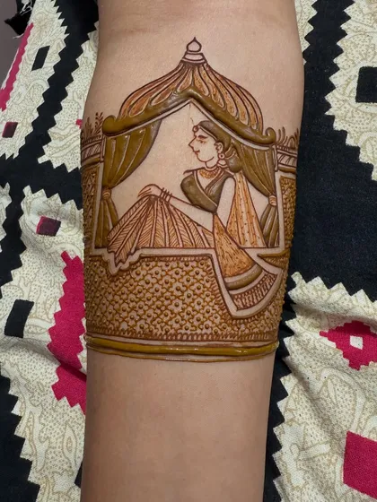 An armband portrait of a bride in a jharokha. This kind of single, detailed figure makes for a stunning and unique arm piece.
