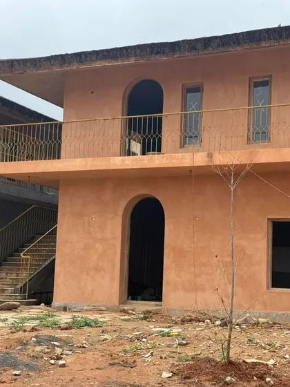 We don't just work inside. This is a completed exterior project featuring a warm, earthy lime plaster finish that gives the building a beautiful, rustic, and timeless look.