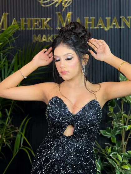 Your wedding events are a chance to shine. I create glamorous looks for receptions, sangeets, and cocktail parties, like this silver-cut crease eye makeup and elegant updo, perfect for a night of dancing.