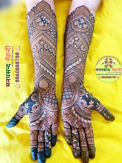 A modern geometric design that covers the entire hand and arm. The repeating patterns and clean lines create a mesmerizing and contemporary look.