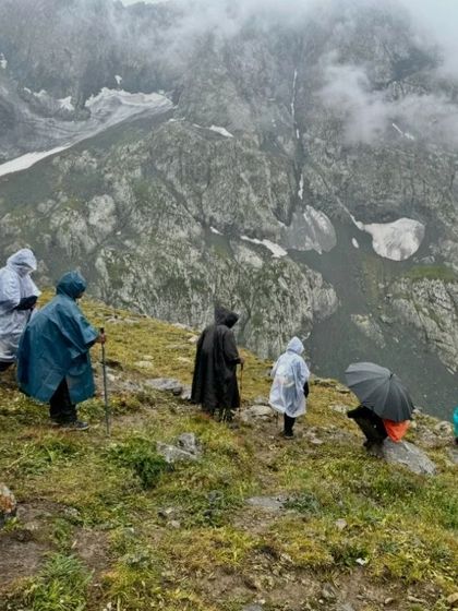 The mountains test you. Here are our trekkers embracing the rain in their ponchos. Every challenge on the trail makes the beautiful moments feel even more rewarding.