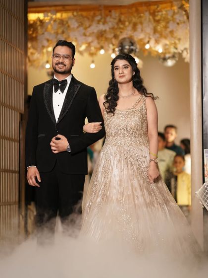 The grand entrance. Her makeup looks stunning even from a distance, with a beautiful glow.