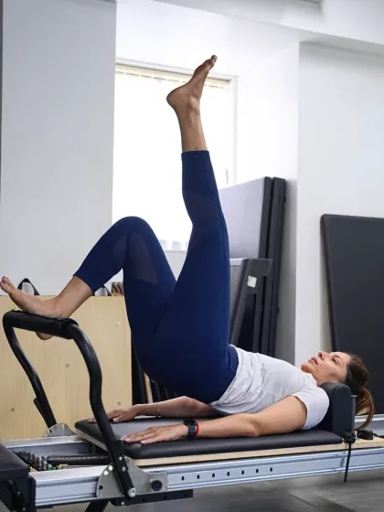 This single leg bridge variation adds a significant stability challenge. Pilates teaches you to move with purpose, ensuring every muscle is engaged correctly for maximum benefit.