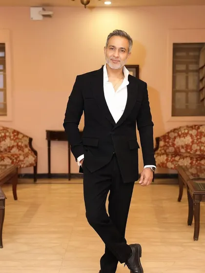 A full-length portrait. A sharp suit is my uniform for the courtroom, representing the professionalism and readiness I bring to every legal battle.