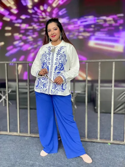A full-length shot of my Holi outfit, showing how I combine style with the practical needs of the event.