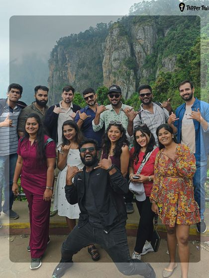 Our crew posing at Pillar Rocks, one of Kodaikanal's iconic spots. With our thoughtfully planned itineraries, we make sure you see the best of the destination while also enjoying the company of a family like crew.