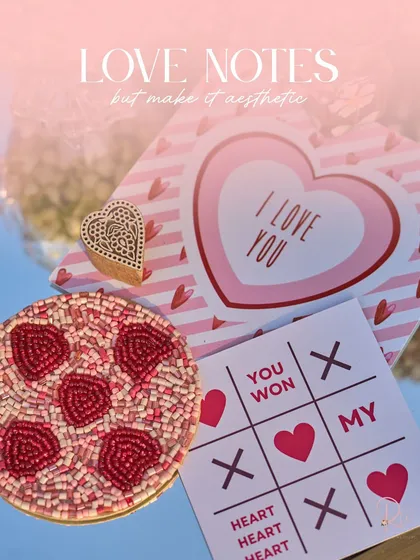 Playful and aesthetic love notes, including a custom tic-tac-toe game, added a fun, personal touch to the table settings.