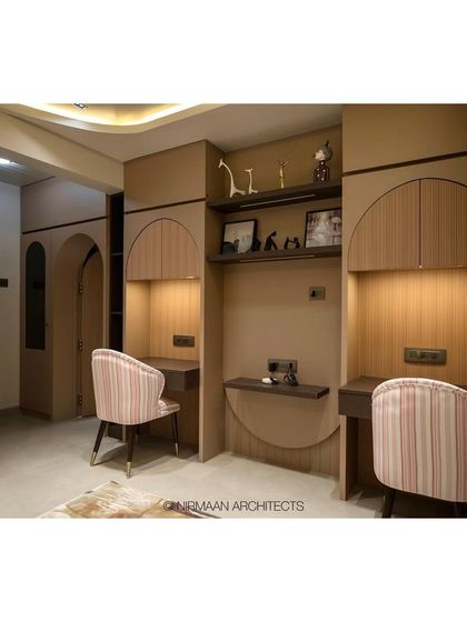 A close-up of the twin study desks in the daughters' bedroom. The symmetrical design provides each child with their own dedicated space for homework and creative projects.