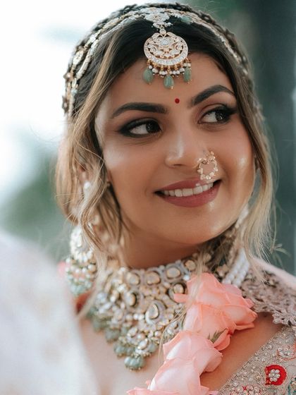 A happy, smiling close-up. Khyati's joy is contagious, and her makeup enhances her beautiful features perfectly.