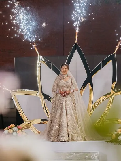 A truly magical bridal entry. We designed this custom lotus float with cold pyros to create a divine and ethereal moment for the bride as she made her way to the stage.