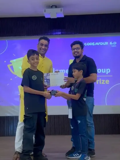 Team Aqua Buddy receiving their Appreciation Award at the Codeavour Nationals. Their innovative project stood out to the judges.