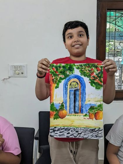 Another beautiful piece by our star student, Shaurya. This watercolor painting of a blue door in a sunlit alley shows his growing confidence with landscapes.