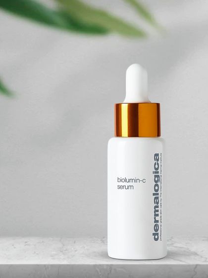 A clean, minimalist shot of a Dermalogica serum bottle. This type of photography is ideal for clinical or science-backed skincare brands that want to convey authority and simplicity.