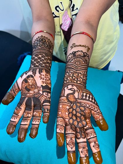 This design was for the Vatsavitri festival, featuring a portrait of Savitri and Satyavan, along with a majestic peacock.