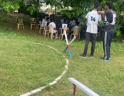 Students strategizing during a group planning exercise on the GTO ground. This task tests your ability to work in a team and come up with practical solutions.