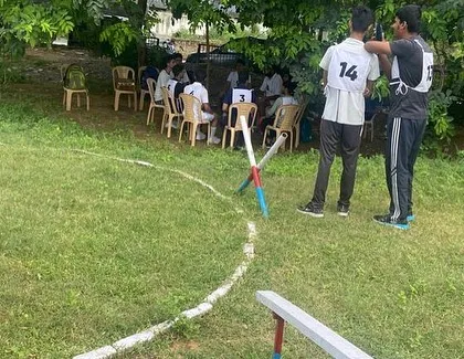 Students strategizing during a group planning exercise on the GTO ground. This task tests your ability to work in a team and come up with practical solutions.