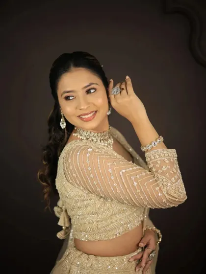 A side view showing the earrings and bracelet that complete the rental jewellery set.