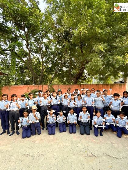 The entire group of young artists from our workshop with their finished frames. It was a day filled with creativity and smiles.