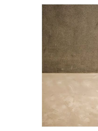 A study in texture for a gallery space. Seamless gray concrete covers the floors and walls, creating a neutral, elemental backdrop that allows the art, music, and people to become the focus.