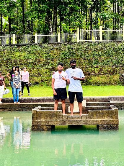 Two friends at the Devagange pond. It's a great place to relax after a trek.