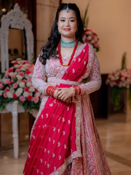 My glowing Nepali bride in a beautiful pink and red lehenga. I used shimmer on her eyes to make them pop and kept the rest of the makeup soft and clean.