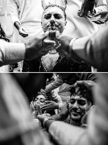 The raw energy of a Haldi ceremony captured in high-contrast black and white, focusing on the textures and emotions of the moment.