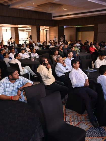 A wide shot of the engaged audience at our 'Udgosh 2.0' event, an initiative to celebrate and empower farmers with new technology.