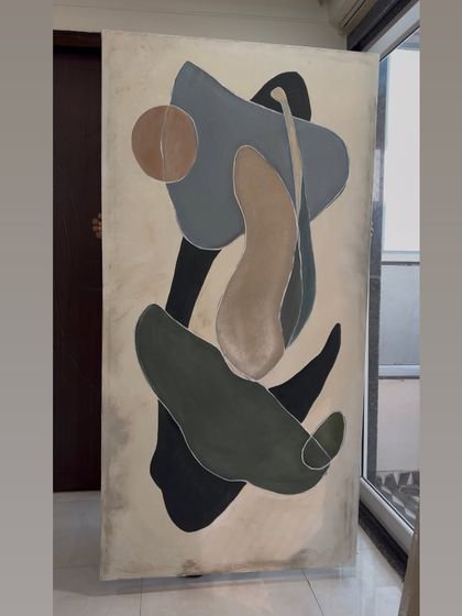 A 6ft x 3ft abstract painting with flowing, organic shapes in a muted palette of grey, beige, and black. This piece was a custom order for a home in Kolkata.