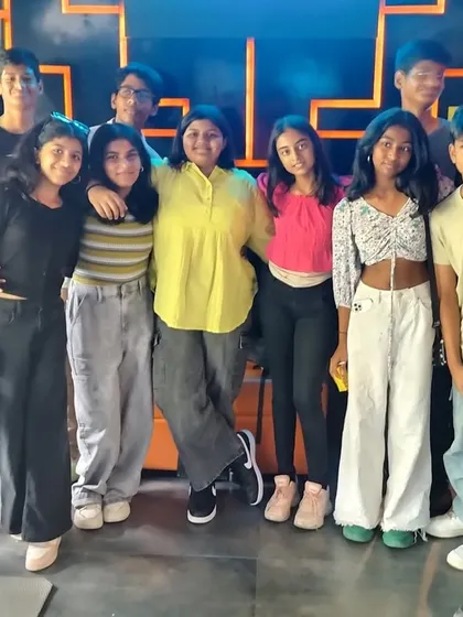 A group of friends celebrating a birthday at The Grid. Our venue is perfect for creating fun memories with your squad on your special day.