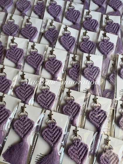 A large batch of lavender heart keychains. This soft, pretty color is perfect for a gentle, boho look.