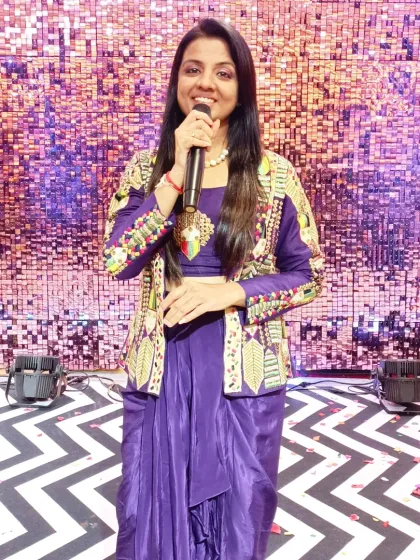 A confident pose on stage. Even with a rough throat that day, I was determined to give my all and make the Sangeet night magical for the couple.