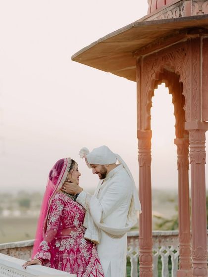 A sweet, intimate moment captured during our wedding photoshoot. It's these small gestures of affection that mean the most.