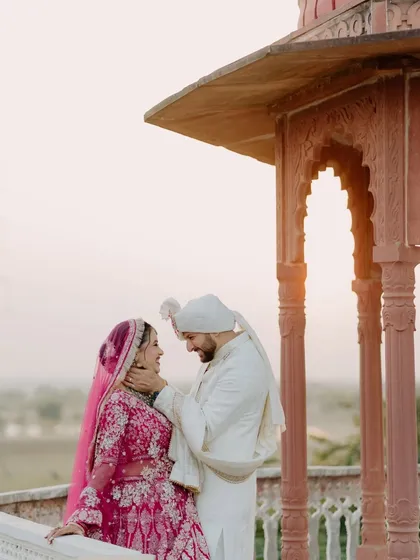A sweet, intimate moment captured during our wedding photoshoot. It's these small gestures of affection that mean the most.