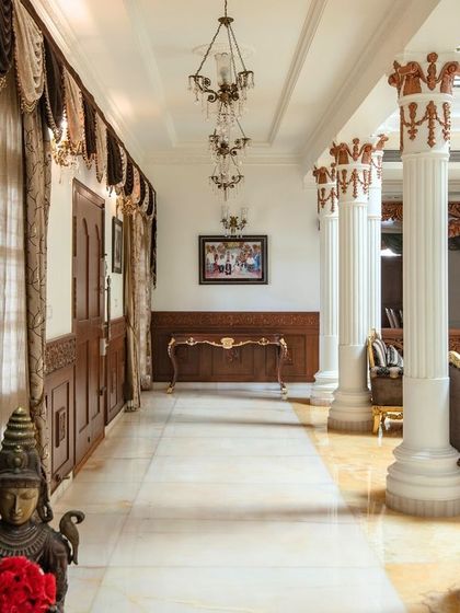 An identical view of the palace corridor, emphasizing the length and the rhythmic repetition of architectural details that create a sense of procession.