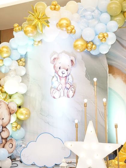 A closer look at the 'A Star is Born' decor, showing the cute teddy bear illustration and the soft cloud cutouts that added to the dreamy, celestial vibe.