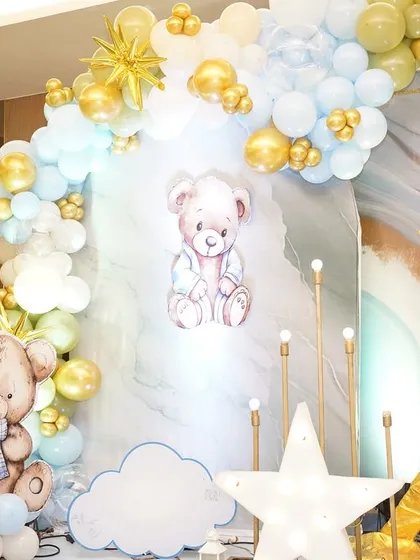 A closer look at the 'A Star is Born' decor, showing the cute teddy bear illustration and the soft cloud cutouts that added to the dreamy, celestial vibe.