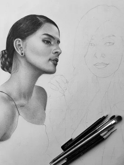 The full view of the Diljot Chhabra WIP, showing the completed portrait next to the outline for another character in the same piece.