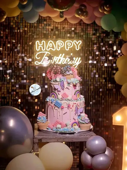 This candyland themed party cake was so much fun to create. With multiple tiers, colorful drips, cupcakes, and tons of sweet details, it shows how I can build a large, vibrant centerpiece for a big celebration.