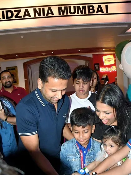 A candid shot of the cake cutting ceremony at Kidzania Mumbai. The cricket stadium cake was a huge hit with all the kids.