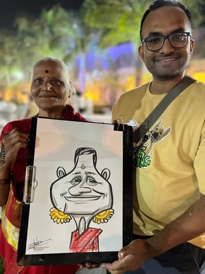 It's truly special to draw the eldest family members. This grandmother's portrait was a touching moment at a wedding in Ambegaon, Pune.
