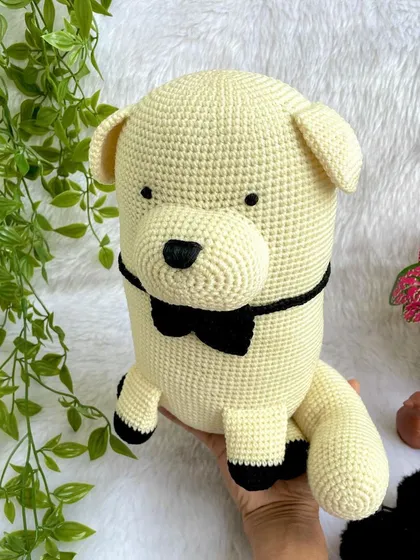 This is Bond, the fluffy dog from the anime Spy x Family. He was made to accompany the Anya doll, creating a perfect pair from the popular series.