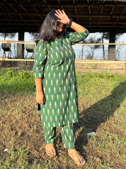 Seeing my customers happy is my greatest joy. Here is a beautiful client enjoying the sun in my green handloom Ikat kurta coords, looking effortlessly stylish and comfortable.