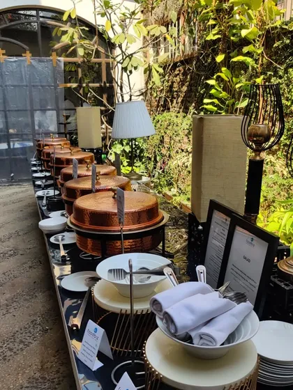 A beautiful brunch buffet line featuring our signature copper dishes. This setup for a private Sunday brunch combines elegance with a relaxed vibe, offering a variety of hot dishes to suit every guest's preference.