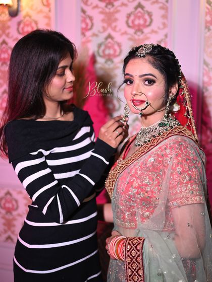 A student carefully applying final touches. This shows the hands-on nature of my classes, where you do the work yourself.