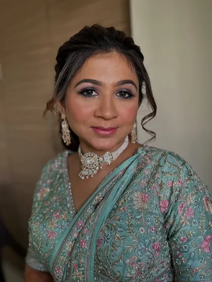 A full-face portrait showing the complete look.