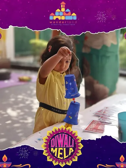 Crafting for Diwali is a favorite activity at our Mela. Here, a child is making her own hanging lantern, developing her fine motor skills while creating something beautiful to celebrate the festival of lights.