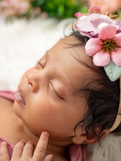 A close-up of this sleeping beauty. You can see every perfect detail, from her eyelashes to her tiny fingers.