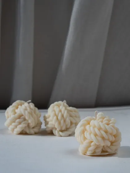 Our knot or braid candles, adding a touch of texture and interest to your decor. These are a must-have for the festive season and beyond.