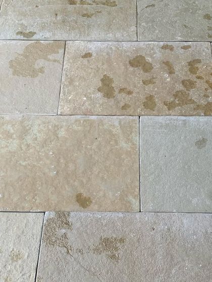 Local Tandur stone laid out on site. The natural variations and earthy tones of the stone are essential to creating floors that feel grounded and connected to the landscape.